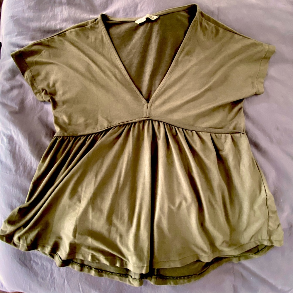 SFERA olive green peplum top in suede material.